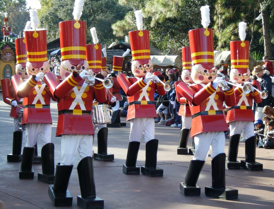 Nutcrackers marching in a Christmas parade, one of Raleigh's many holiday events.