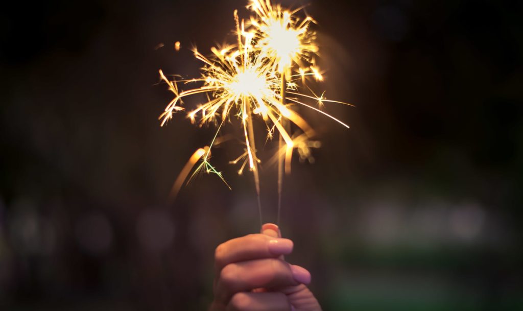 A sparkler at a New Year's Eve event.